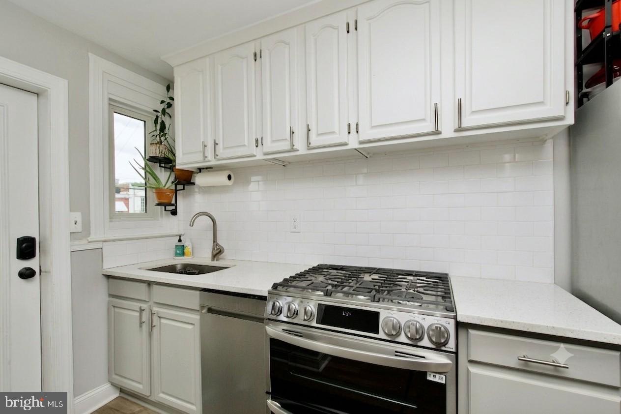 1702 Lang Place Northeast Washington, DC 20002 - Photo 11 of 29 Modern kitchen with sleek finishes.