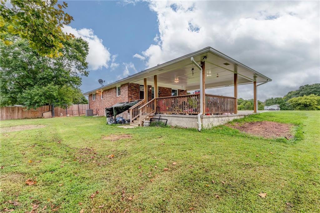 2020 Old Cedartown Road Cedartown, GA 30125 - Photo 27 of 33 a view of a house with a backyard