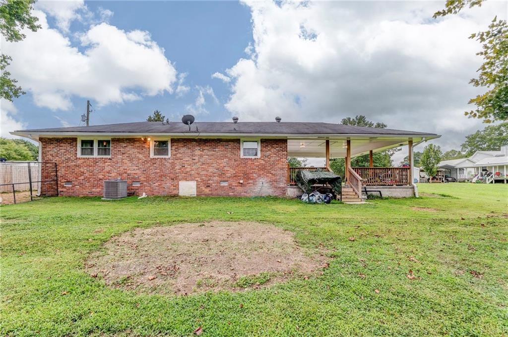 2020 Old Cedartown Road Cedartown, GA 30125 - Photo 28 of 33 a front view of house with yard and outdoor seating