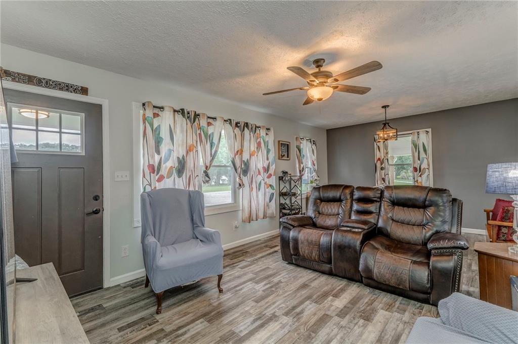 2020 Old Cedartown Road Cedartown, GA 30125 - Photo 7 of 33 a living room with furniture and a large window