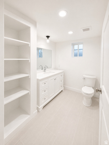 1285 West Maple Street Mapleton, UT 84664 - Photo 20 of 34 Contemporary bathroom featuring a white vanity with dual sinks, a large wall mirror, and white tiled flooring