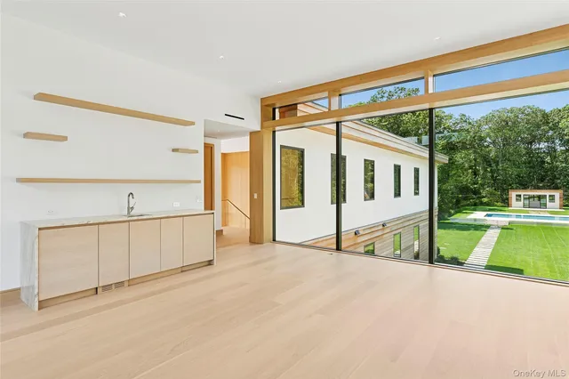 a view of front door and small yard