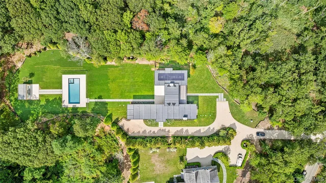 a small pool with a yard