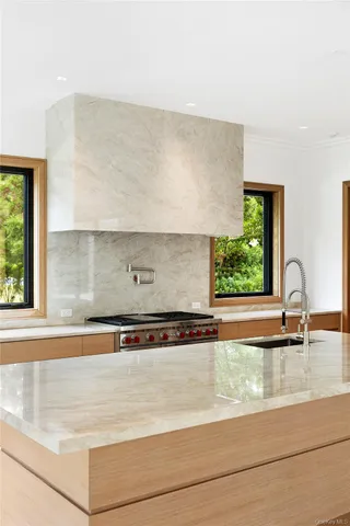 a view of a kitchen cabinets and a counter top