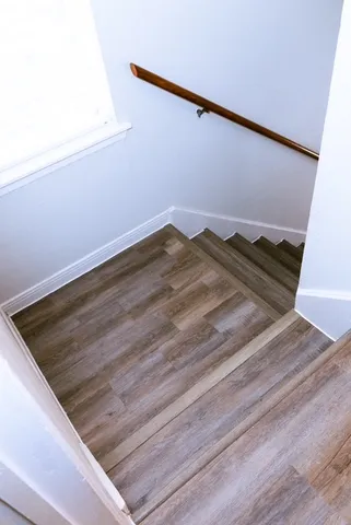 a kitchen with a stove oven and a sink