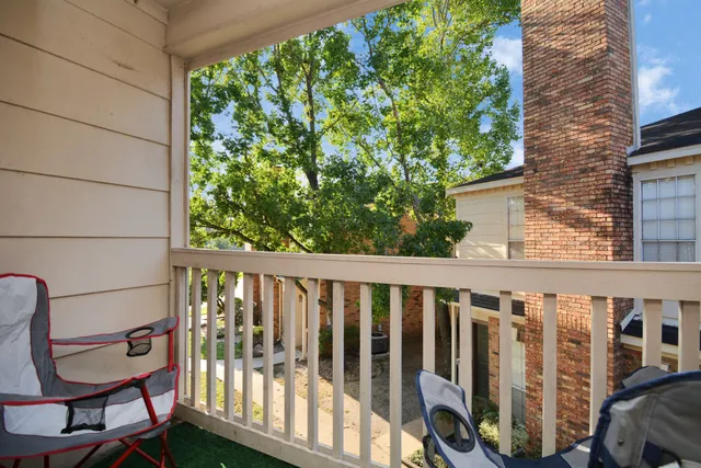 a view of a house with swimming pool