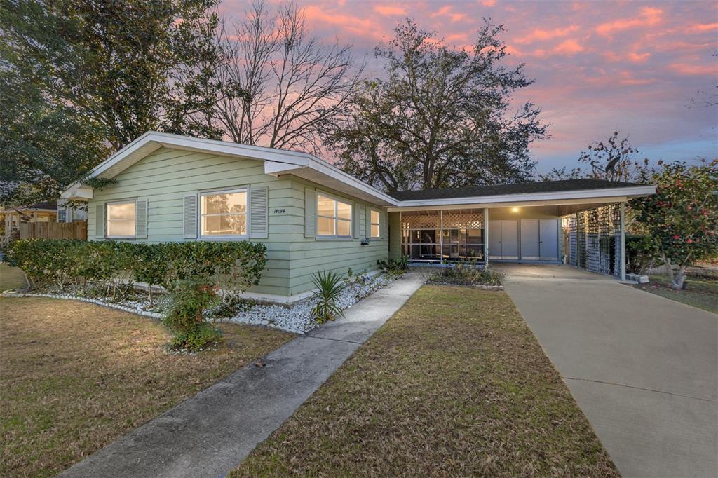 14644 Southwest 35th Terrace Road Ocala, FL 34473 - Photo 1 of 1 front view of a house with a yard