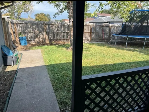 a view of swimming pool from a balcony