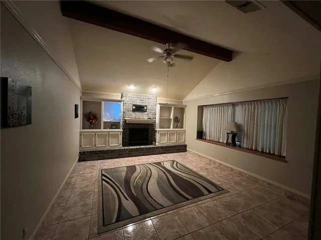 a view of livingroom with kitchen