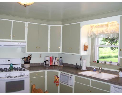 78 West Townsend Road Lunenburg, MA 01462 - Photo 2 of 10 a kitchen with a sink cabinets and window