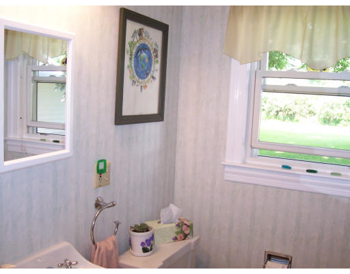 78 West Townsend Road Lunenburg, MA 01462 - Photo 6 of 10 a bathroom with a window a sink and a window
