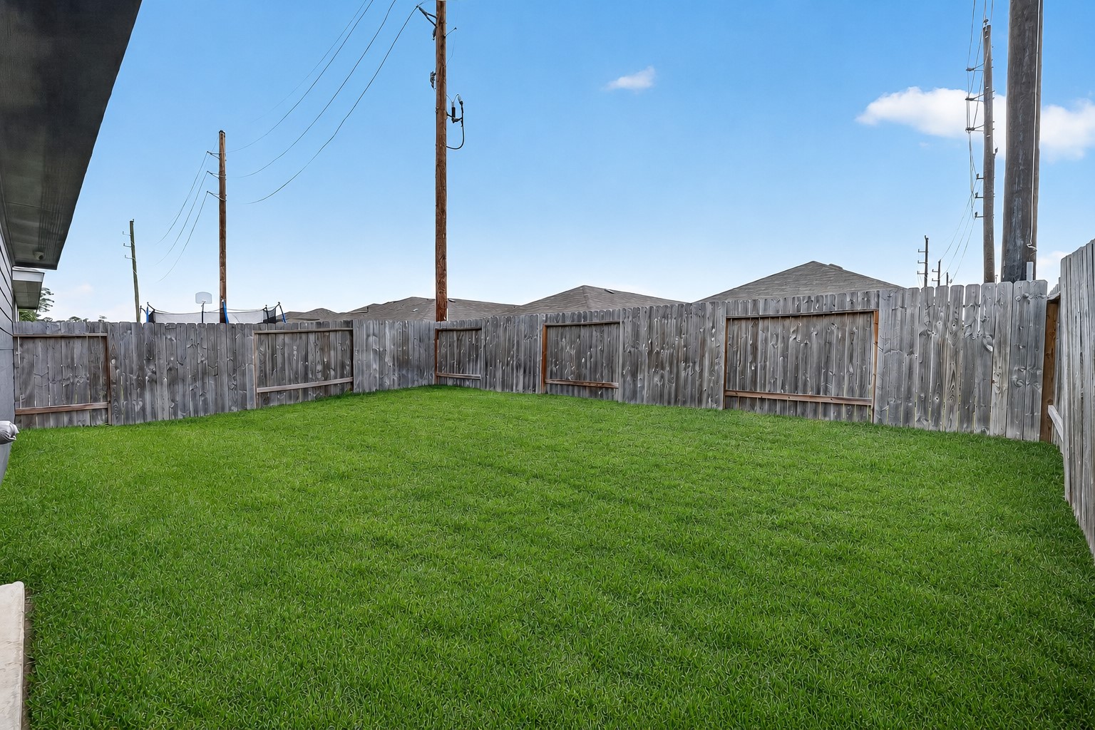 24318 Pebble Crescent Ln Spring Spring, TX 77373 - Photo 29 of 30 Step outside to a fully fenced backyard designed for both relaxation and entertaining! Enjoy morning coffee or evening gatherings under the covered patio while taking in the spacious yard with plenty of room for pets, play, gardening, or future outdoor additions. This private outdoor retreat offers the perfect blend of comfort, functionality, and space to enjoy year-round.