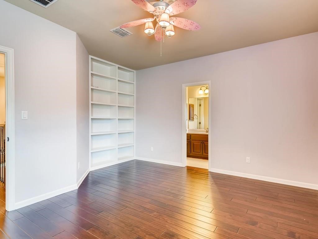 215 Reveille Road Austin, TX 78746 - Photo 25 of 40 Upstairs bedroom 1 with its own bathroom
