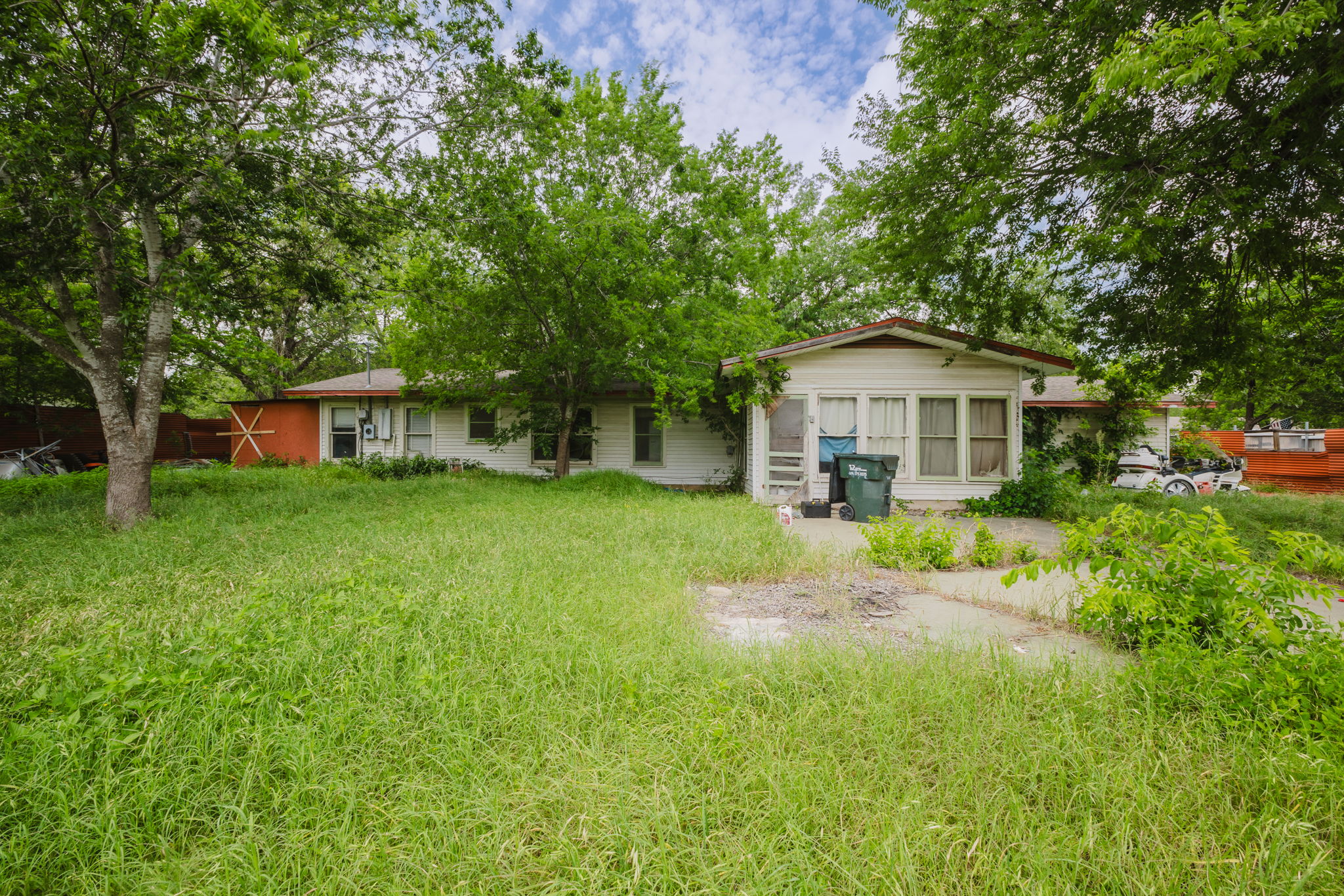 6803 Viewing Place Austin, TX 78719 - Photo 15 of 20 A classic ranch home with ample front yard space and mature shade trees awaits your vision.
