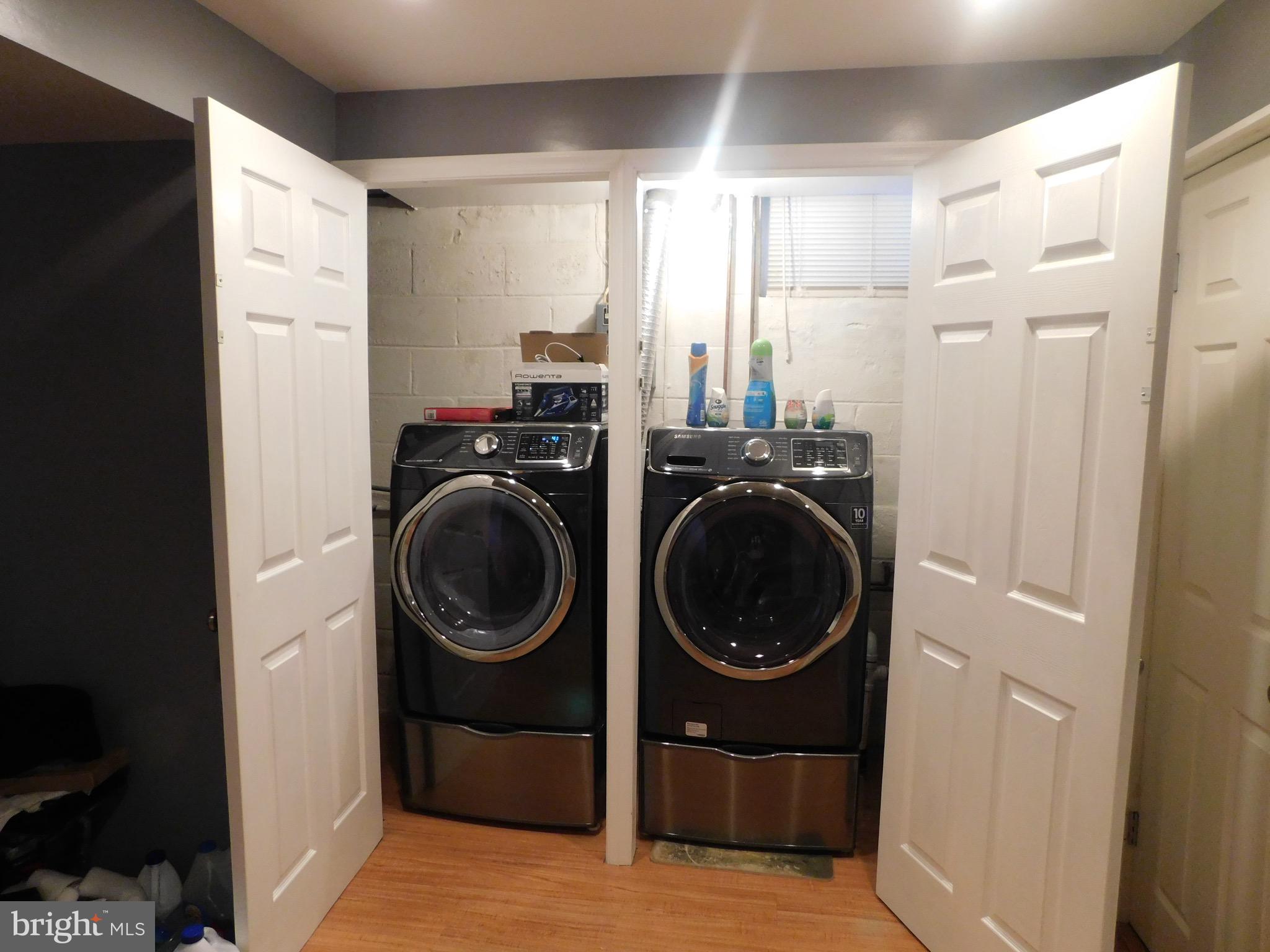 1333 Deanwood Road Baltimore, MD 21234 - Photo 12 of 40 a utility room with sink dryer and washer