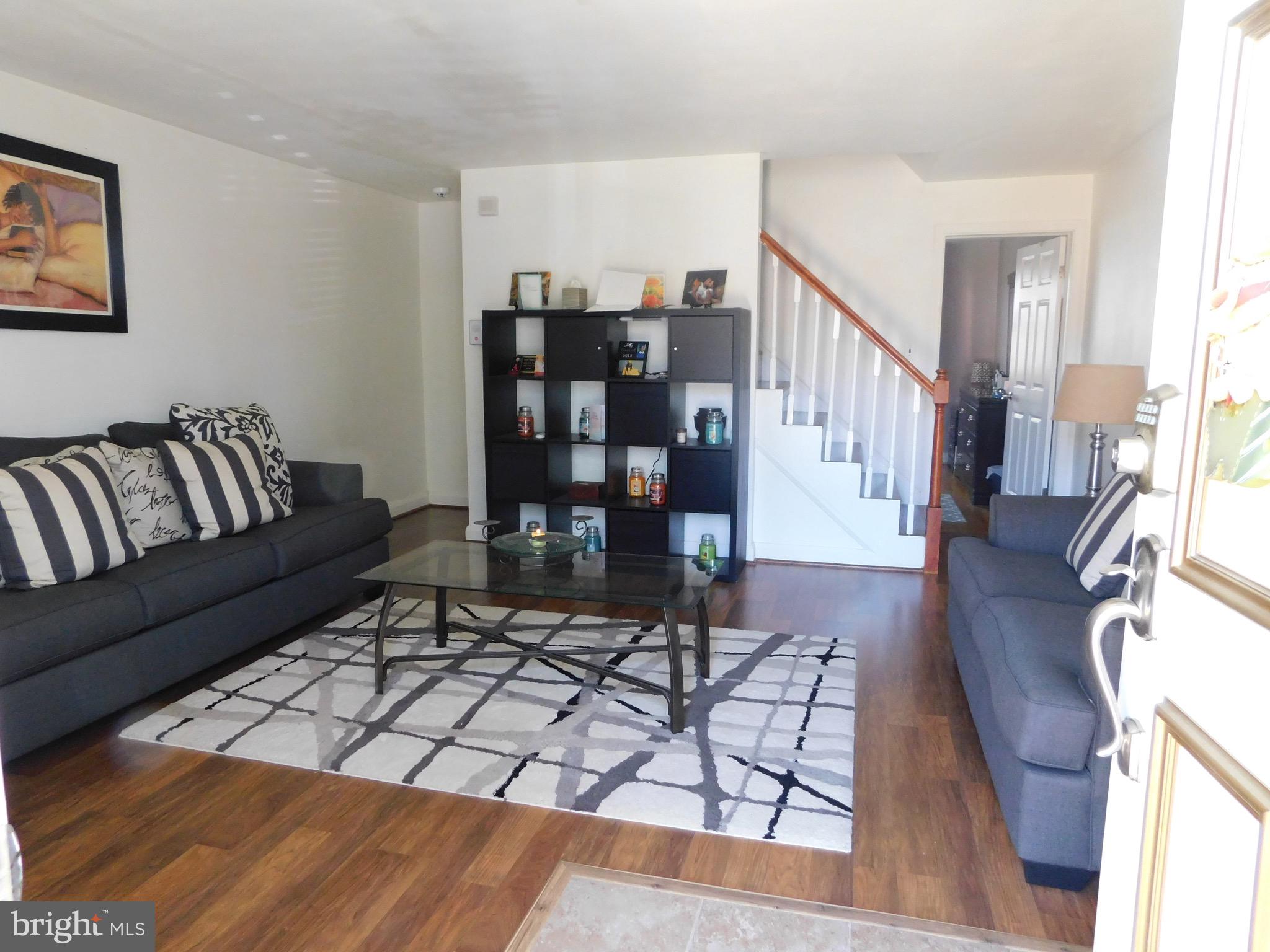 1333 Deanwood Road Baltimore, MD 21234 - Photo 17 of 40 a living room with furniture rug and wooden floor