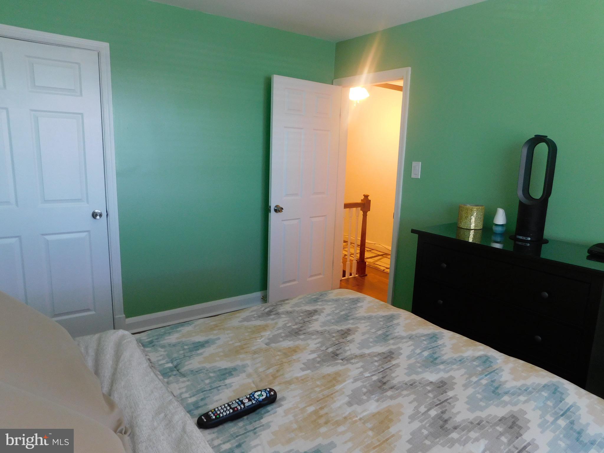 1333 Deanwood Road Baltimore, MD 21234 - Photo 23 of 40 a bedroom with a bed and a dresser