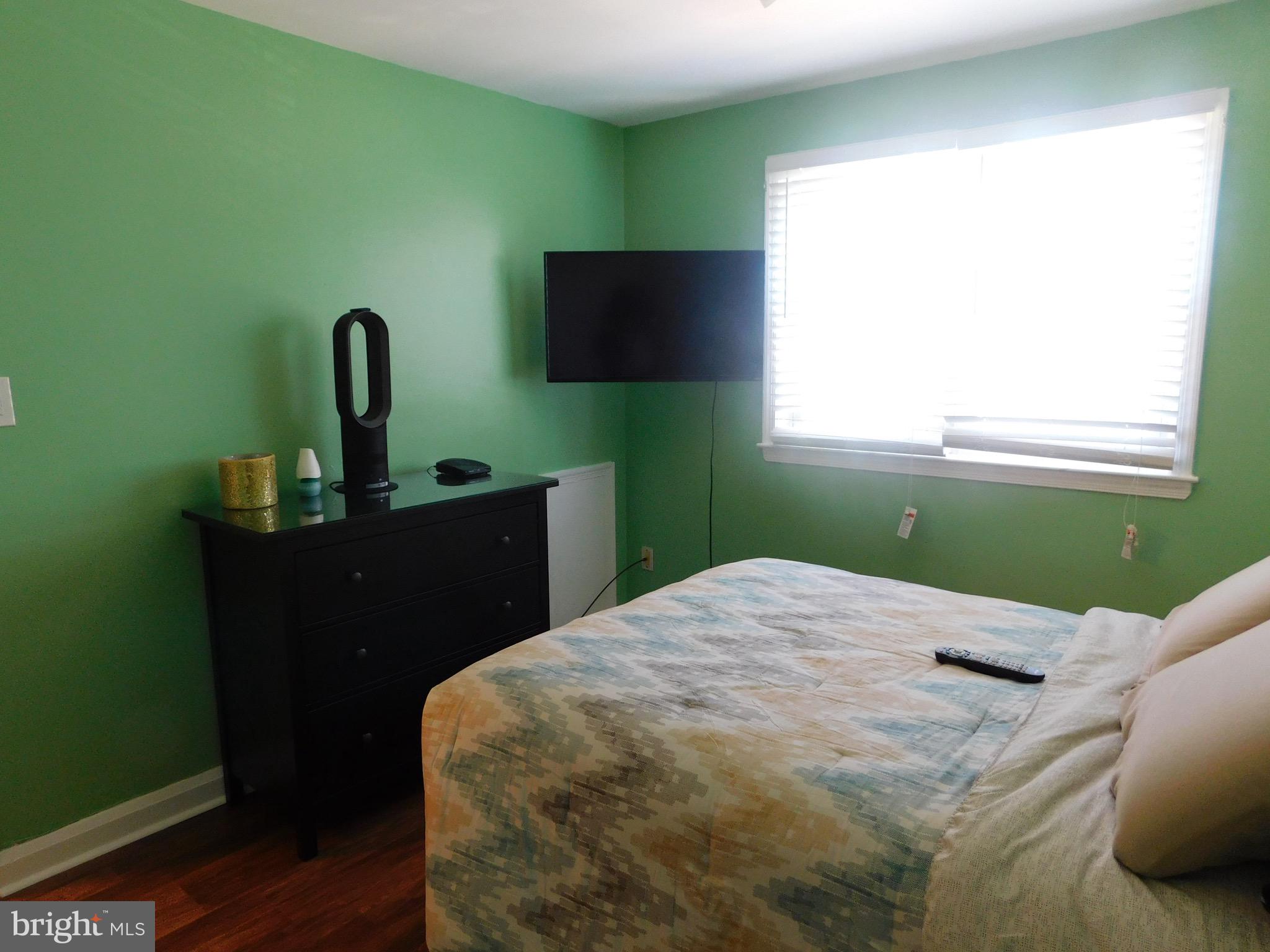 1333 Deanwood Road Baltimore, MD 21234 - Photo 24 of 40 a bedroom with a bed and a window