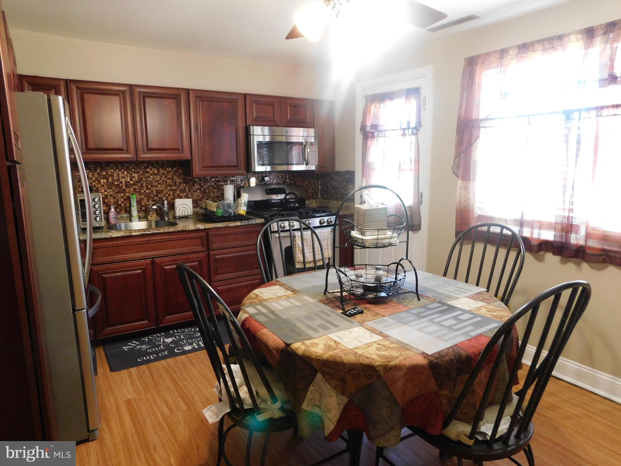 1333 Deanwood Road Baltimore, MD 21234 - Photo 4 of 40 a view of a dining room with furniture window and outside view