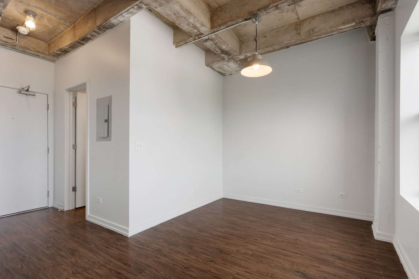 1325 West Wilson Avenue, Unit 1006 Chicago, IL 60640 - Photo 5 of 21 a view of a room with wooden floor