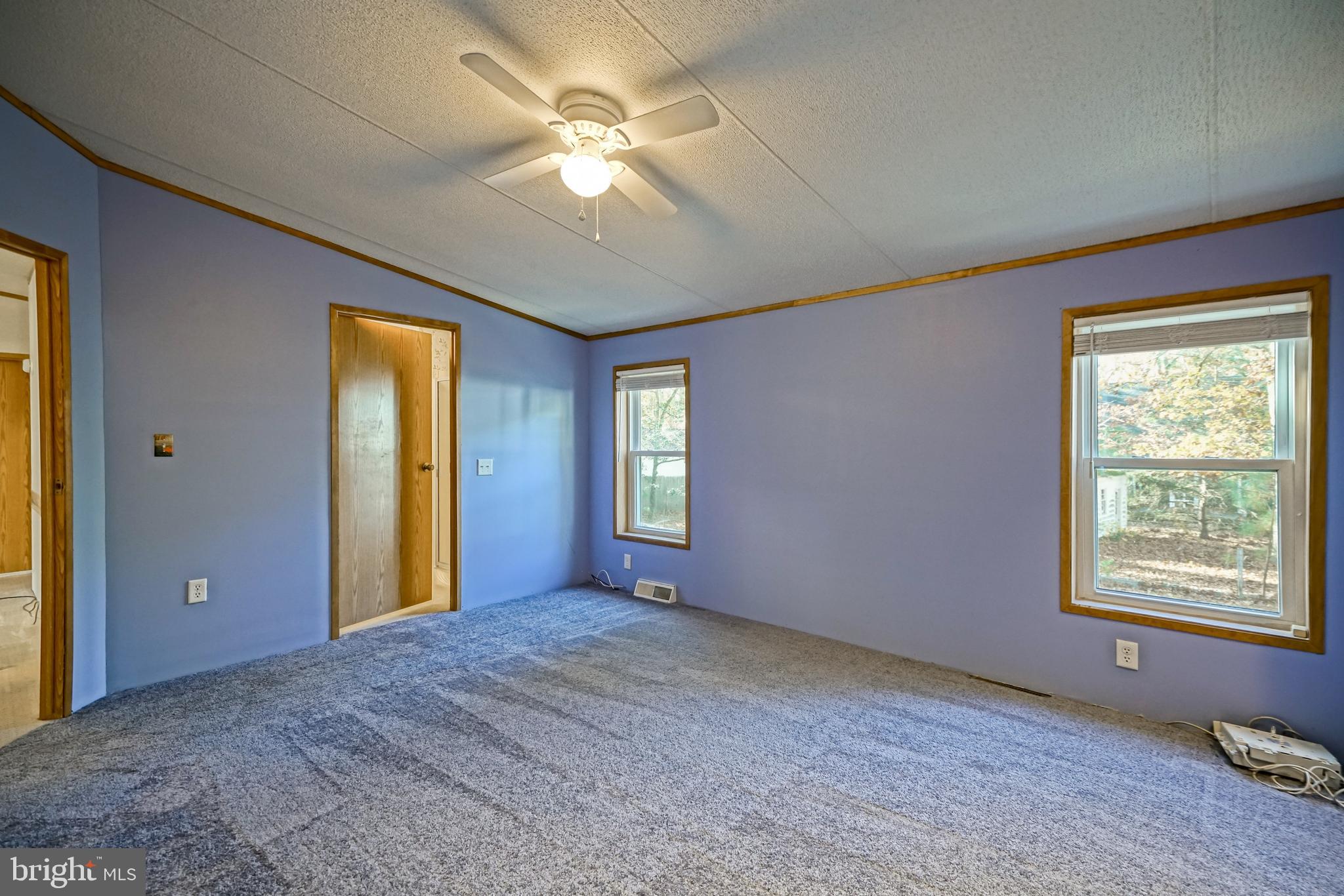 22916 Pine Road Lewes, DE 19958 - Photo 13 of 35 a view of an empty room with a window
