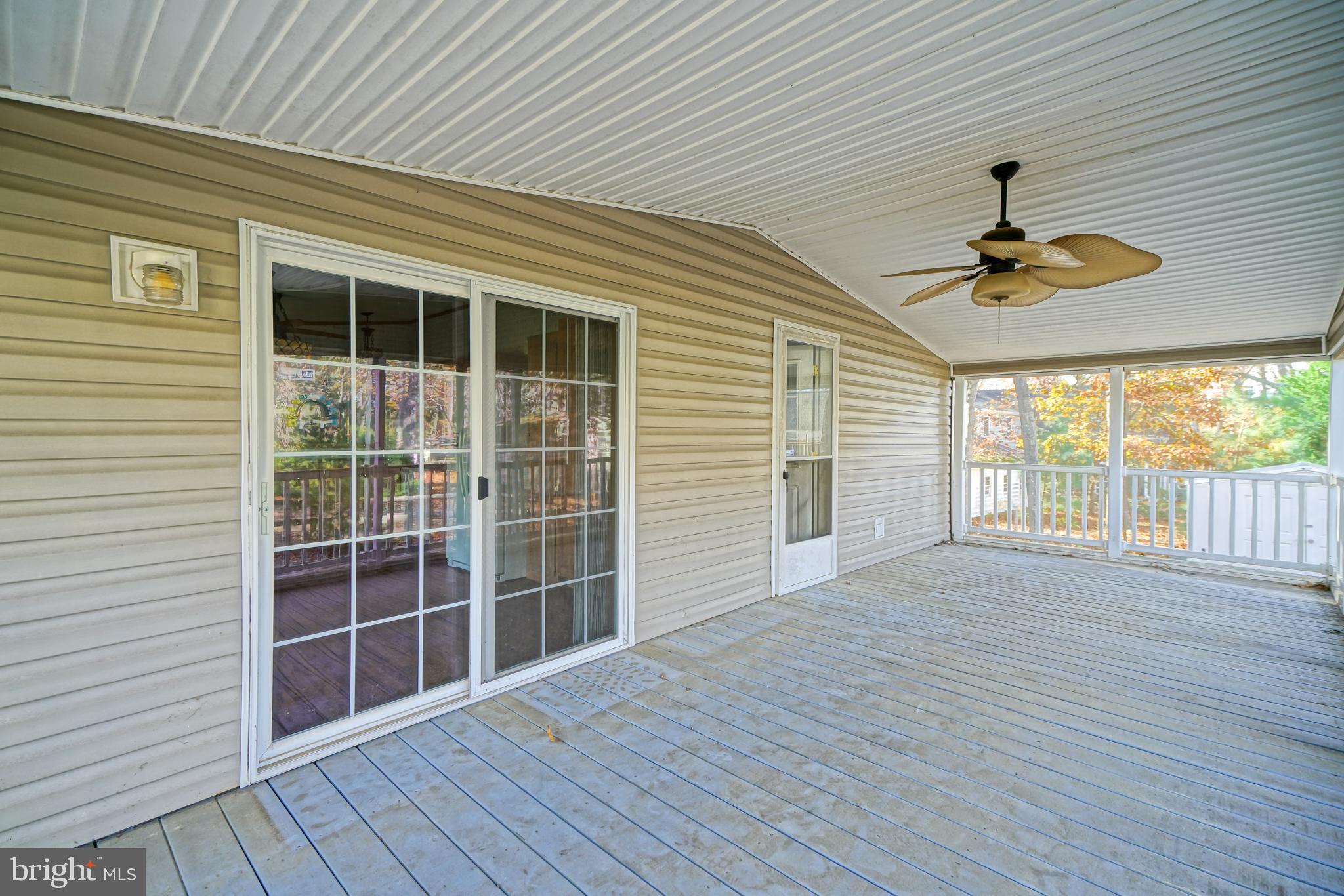 22916 Pine Road Lewes, DE 19958 - Photo 25 of 35 a view of empty room with wooden floor and fan