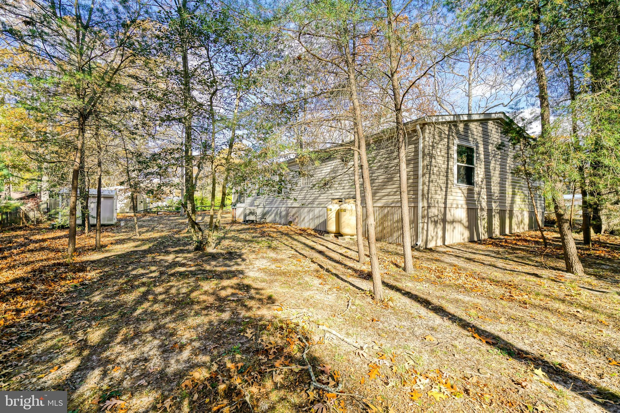22916 Pine Road Lewes, DE 19958 - Photo 29 of 35 a view of a pathway of a house
