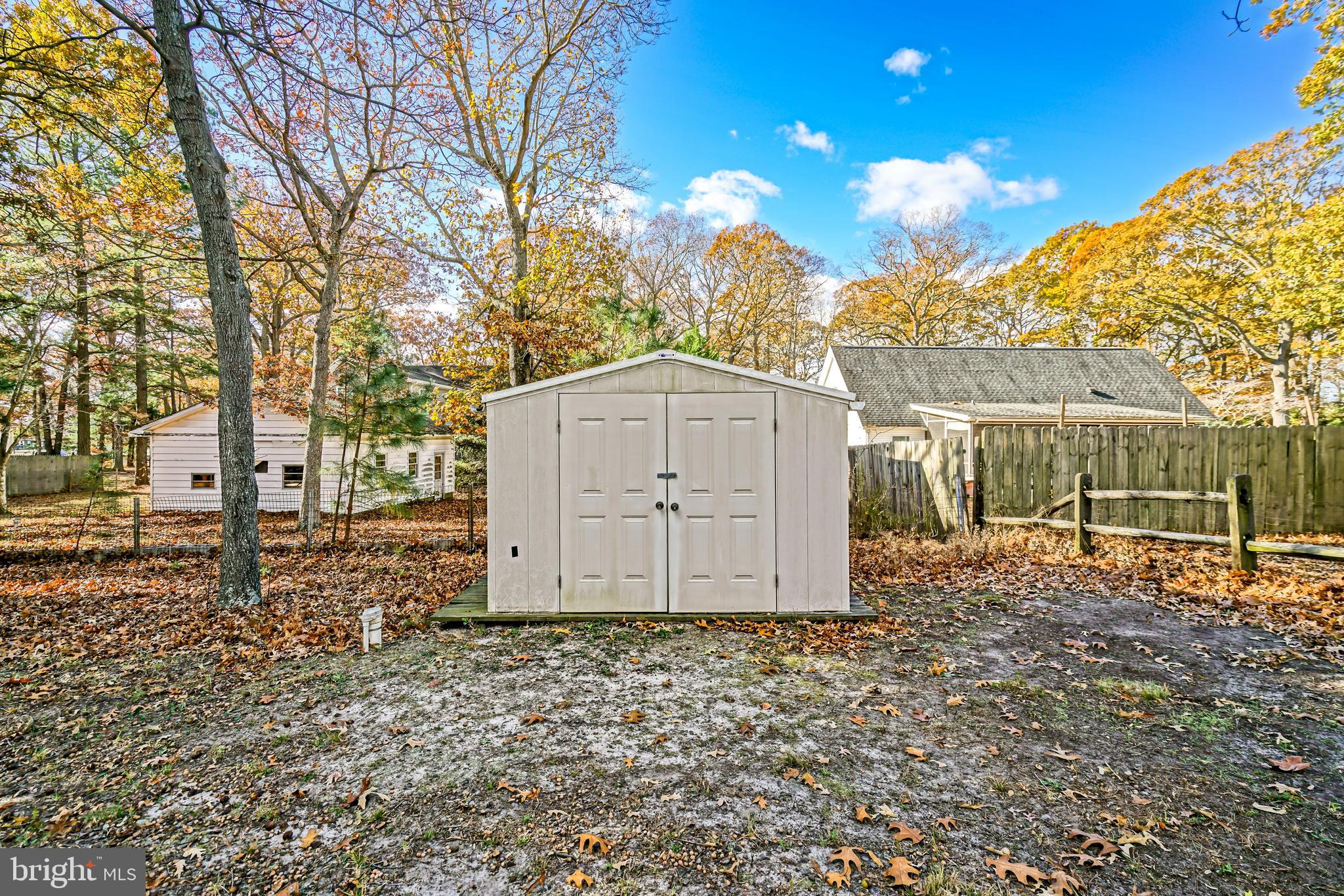 22916 Pine Road Lewes, DE 19958 - Photo 30 of 35 a view of a barn house in the middle of a yard