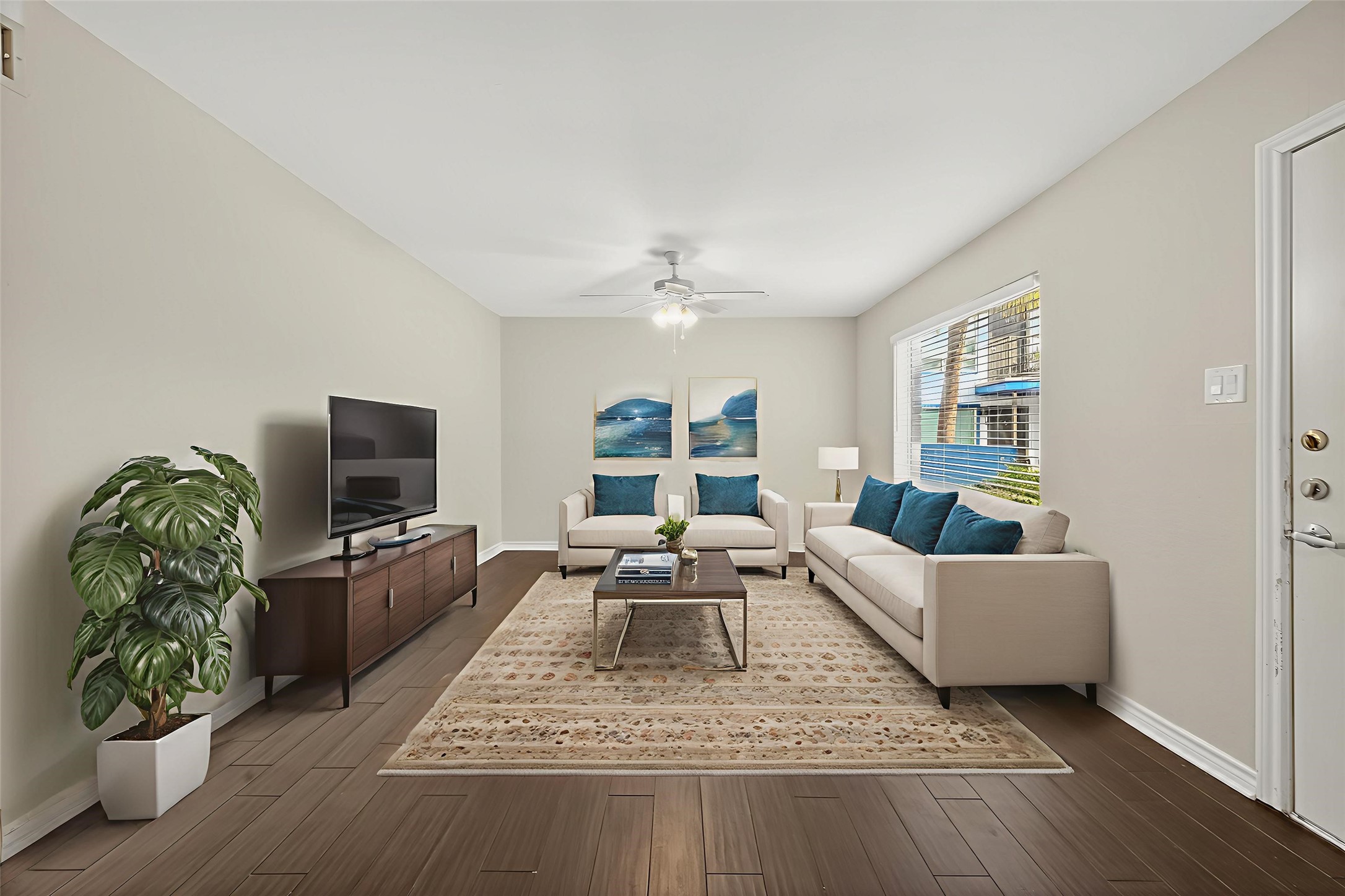 2020 Huldy Street, Unit 2 Houston, TX 77019 - Photo 13 of 34 a living room with furniture or couch and a flat screen tv