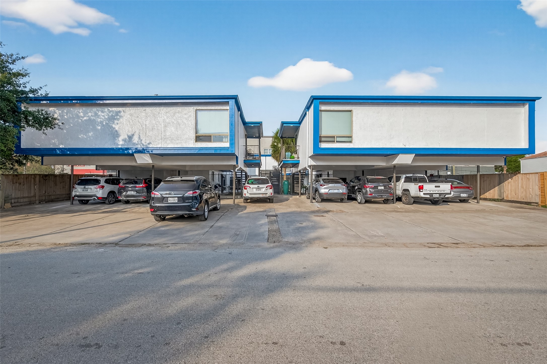 2020 Huldy Street, Unit 2 Houston, TX 77019 - Photo 2 of 34 a car parked in front of a building
