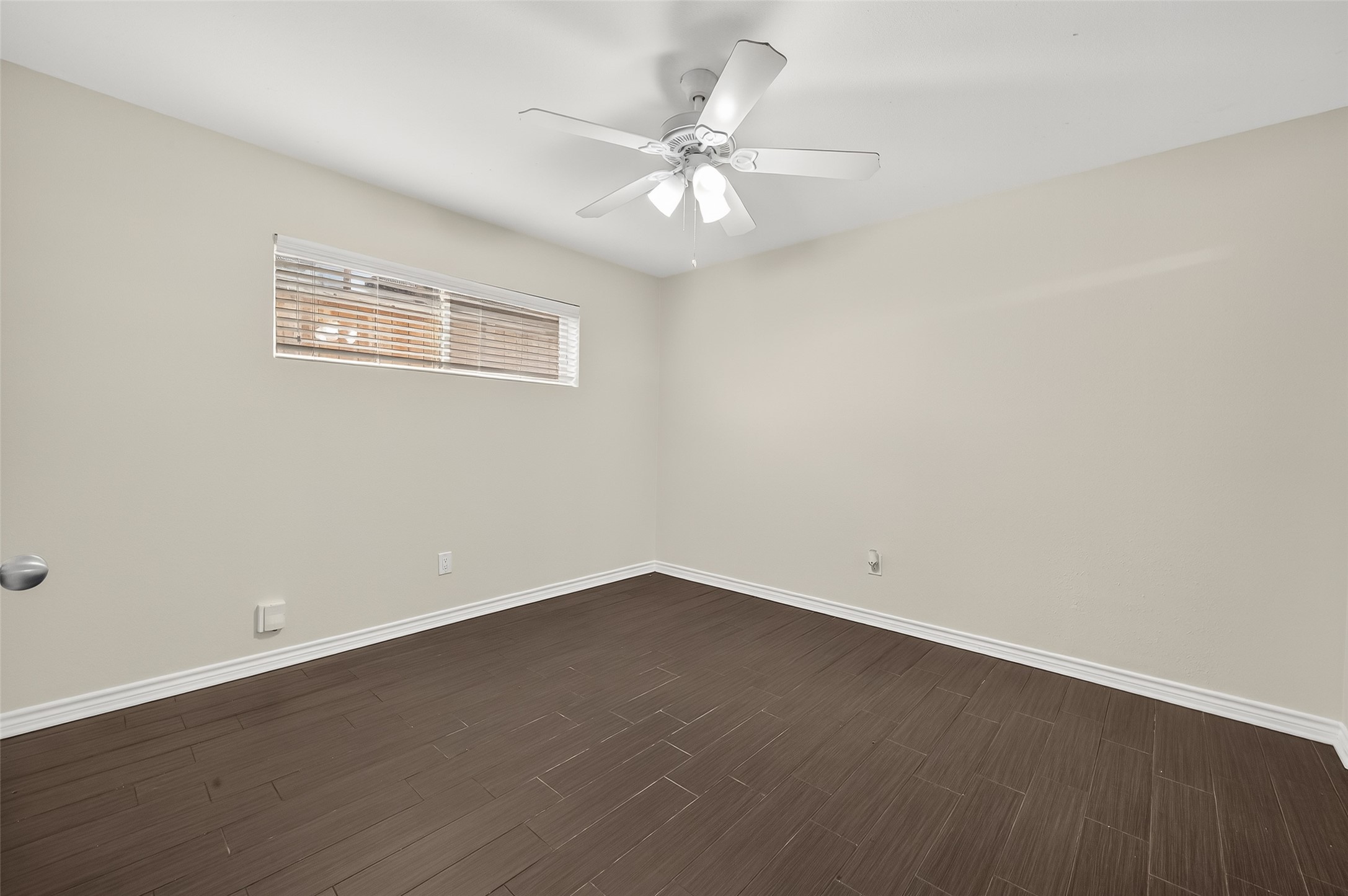 2020 Huldy Street, Unit 2 Houston, TX 77019 - Photo 24 of 34 a view of an empty room with a window