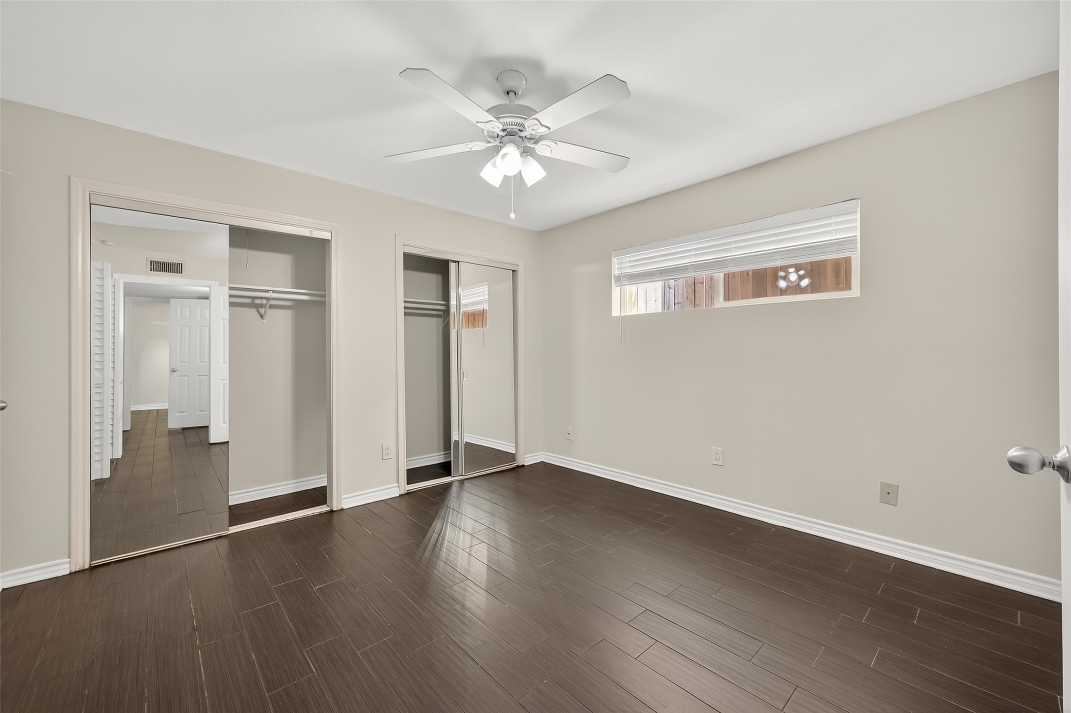 2020 Huldy Street, Unit 2 Houston, TX 77019 - Photo 29 of 34 a view of an empty room with wooden floor
