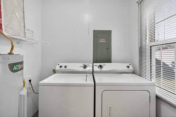 a utility room with dryer and washer