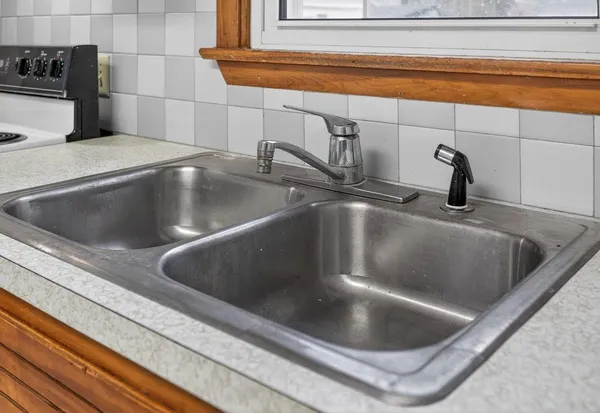 a view of a kitchen from the hallway