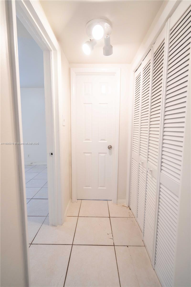 666 Northeast 80th Street, Unit 9 Miami, FL 33138 - Photo 8 of 16 a bathroom with a shower
