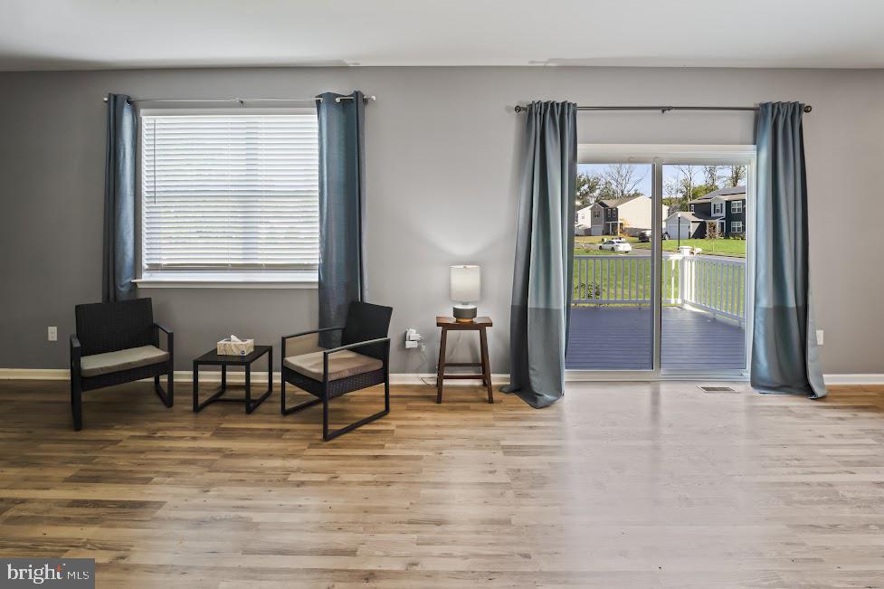 705 Beechwood Drive Deptford, NJ 08096 - Photo 12 of 39 a living room with furniture and a window