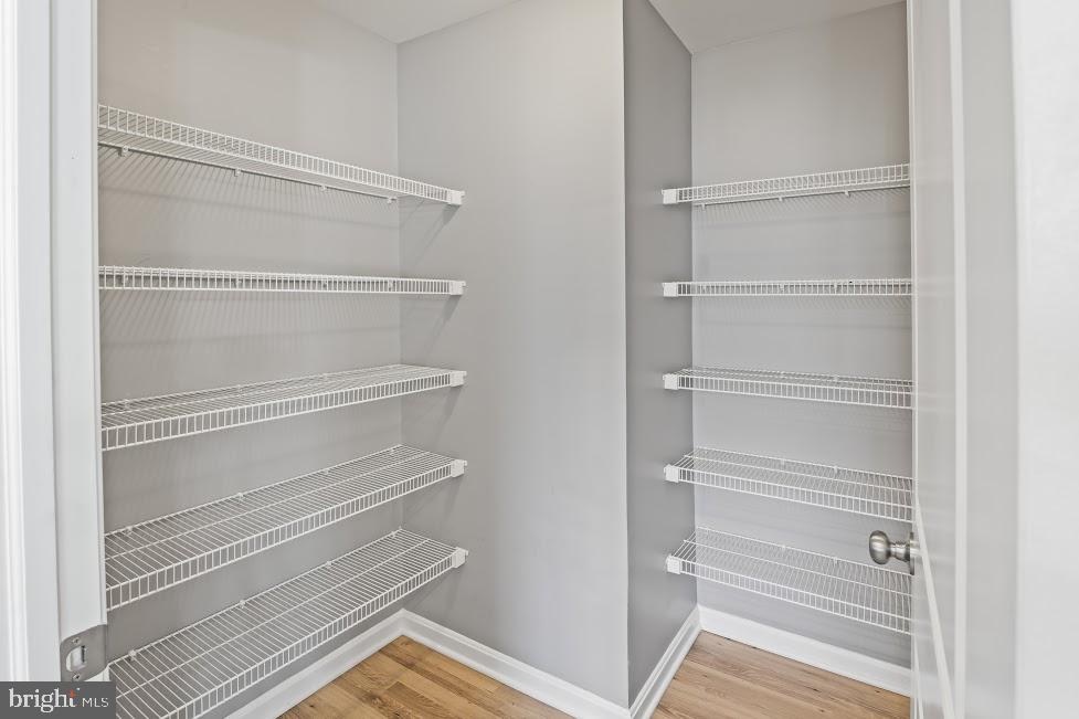 705 Beechwood Drive Deptford, NJ 08096 - Photo 18 of 39 a view of walk in closet with empty racks