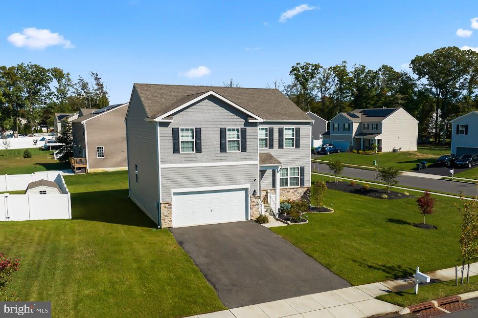 705 Beechwood Drive Deptford, NJ 08096 - Photo 2 of 39 a front view of a house with a yard