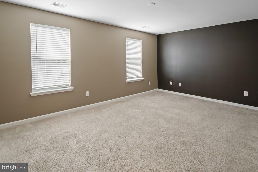 705 Beechwood Drive Deptford, NJ 08096 - Photo 21 of 39 a view of an empty room with a window