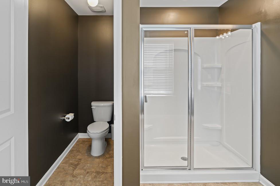 705 Beechwood Drive Deptford, NJ 08096 - Photo 26 of 39 a bathroom with a toilet and a shower