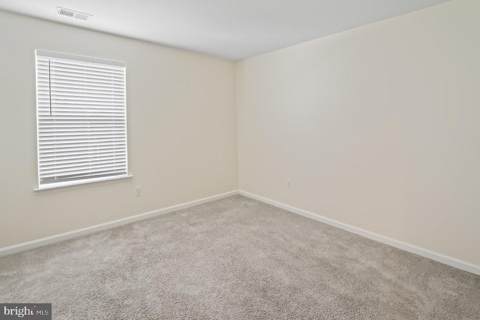 705 Beechwood Drive Deptford, NJ 08096 - Photo 27 of 39 an empty room with a window