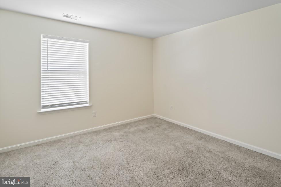 705 Beechwood Drive Deptford, NJ 08096 - Photo 28 of 39 an empty room with a window