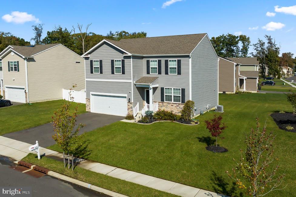 705 Beechwood Drive Deptford, NJ 08096 - Photo 3 of 39 a view of a house with a backyard