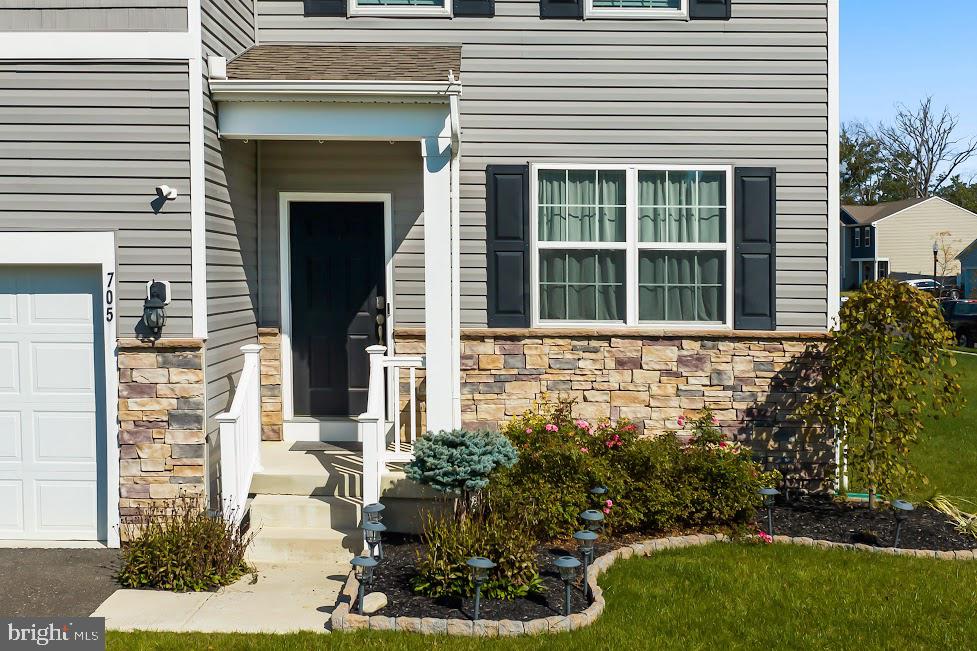 705 Beechwood Drive Deptford, NJ 08096 - Photo 4 of 39 a front view of a house with garden