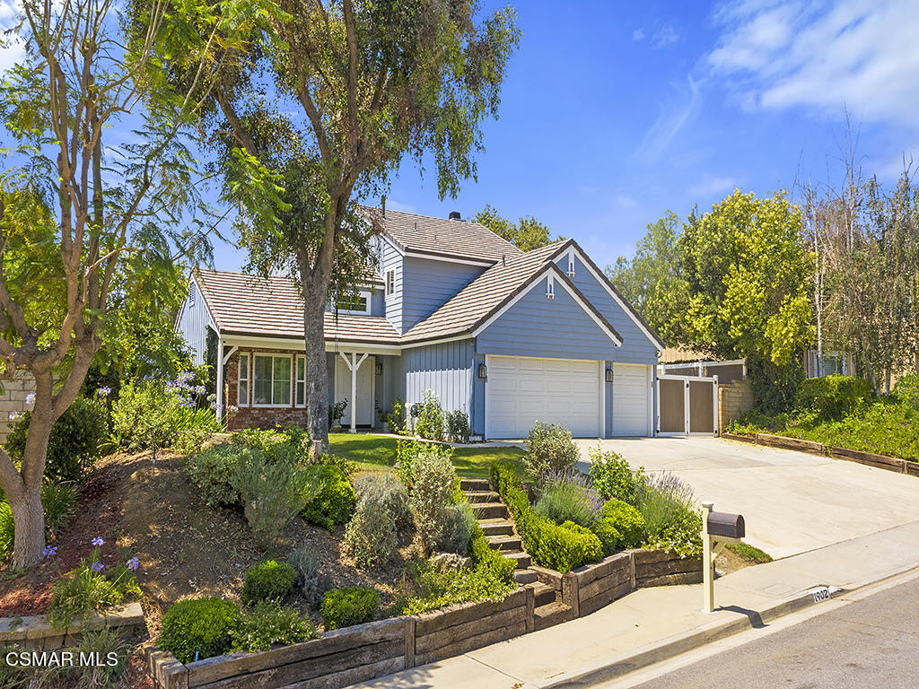 1902 Rambling Road Simi Valley, CA 93065 - Photo 1 of 67 a front view of a house with a yard