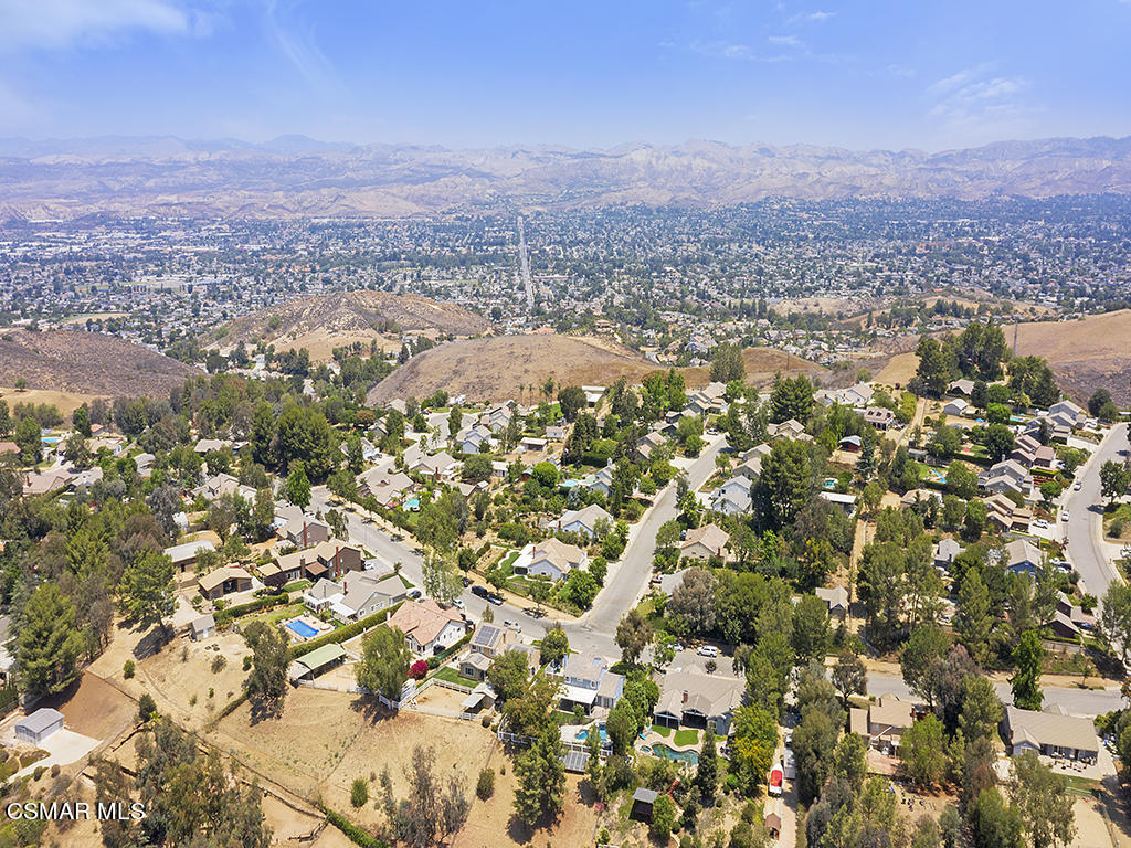 1902 Rambling Road Simi Valley, CA 93065 - Photo 16 of 67 an aerial view of residential houses with outdoor space and trees