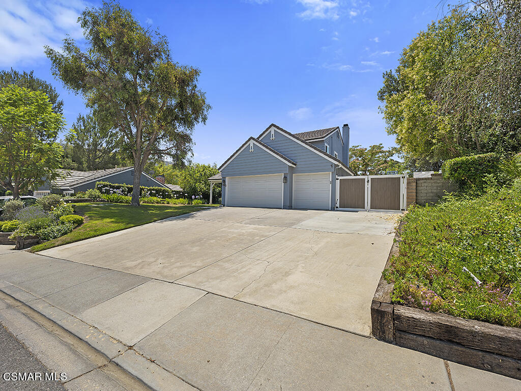 1902 Rambling Road Simi Valley, CA 93065 - Photo 20 of 67 front view of a house with a street