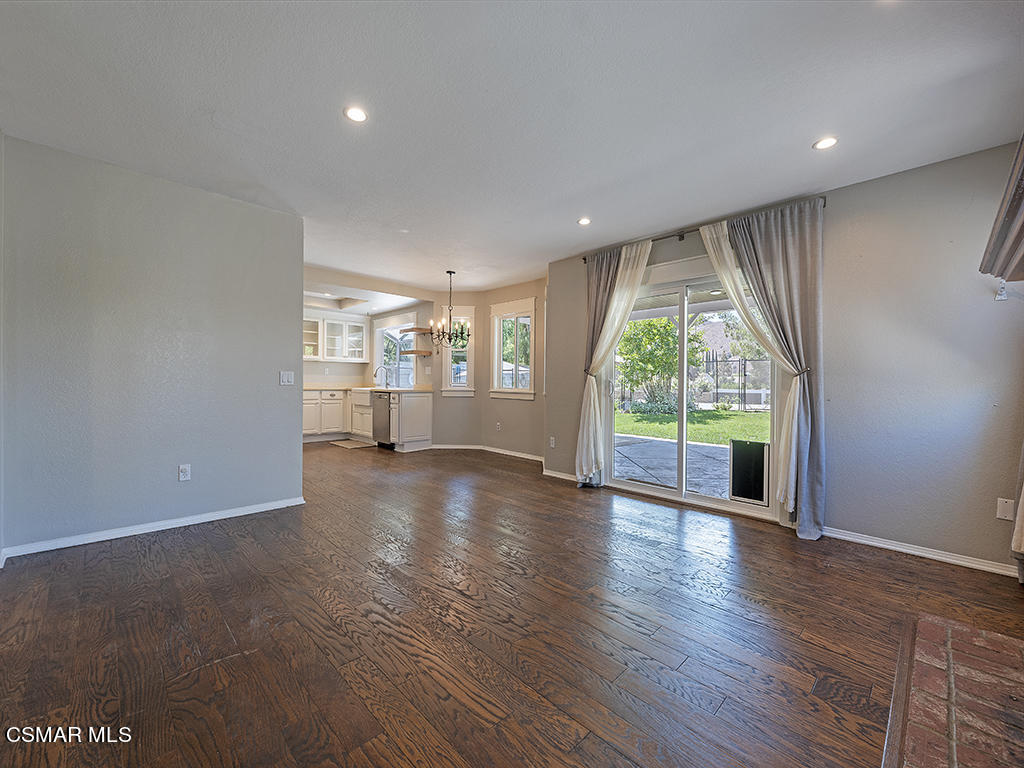 1902 Rambling Road Simi Valley, CA 93065 - Photo 29 of 67 a view of empty room with wooden floor and fan