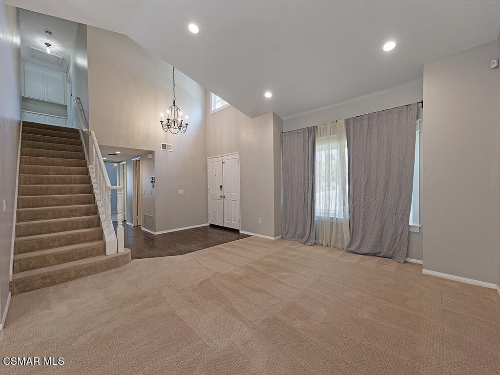 1902 Rambling Road Simi Valley, CA 93065 - Photo 40 of 67 a view of an empty room with wooden stairs