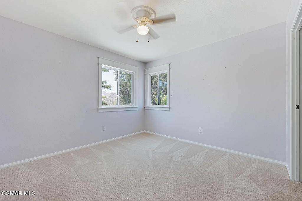 1902 Rambling Road Simi Valley, CA 93065 - Photo 46 of 67 an empty room with windows and fan